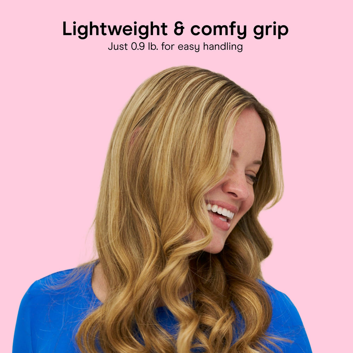 Conair Curling Iron on a vanity with hair products