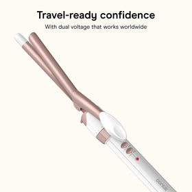 Conair Curling Iron on a vanity with hair products