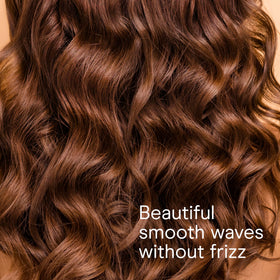 Conair Curling Wand in lifestyle setting with styled hair