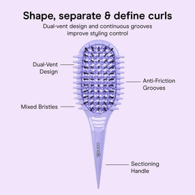 Conair Detangling Brush on a bathroom counter