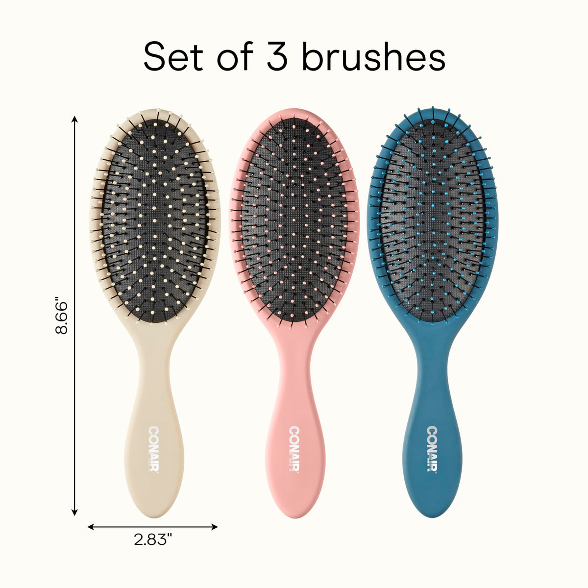 Conair detangling brush set in beige, navy, and coral on white background