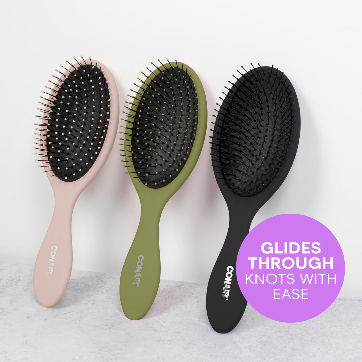 Conair Detangling Hair Brush Set displayed on a vanity