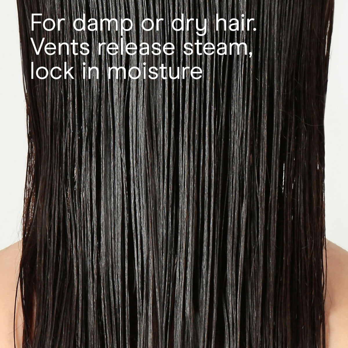 Conair Double Ceramic Flat Iron in use on hair