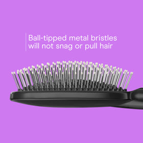 Conair hair brush for thick and curly hair in use