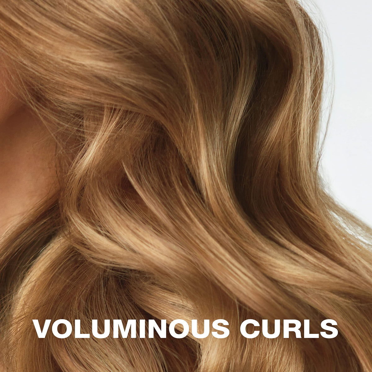 Conair Heatless Curls Extra Large Hair Rollers in use on long hair