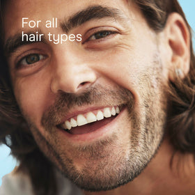 Conair Men Hair Brush in a travel toiletry bag