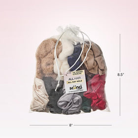 Conair Satin Scrunchies in a reusable mesh drawstring bag