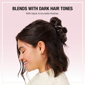 Conair Scünci Octopus Claw Clip set on a vanity with hair products