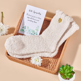 Contents of Peacoeye Sympathy Gift Basket displayed