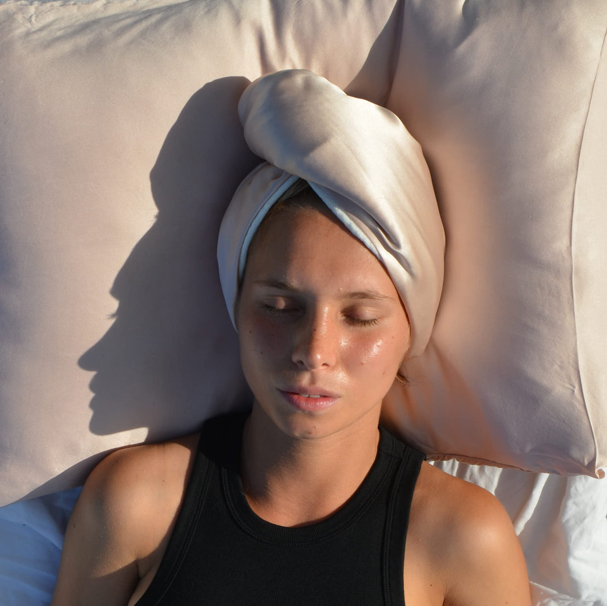 Cool Mom's Closet hair towel draped elegantly on a chair