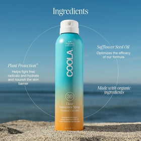 COOLA Clear Sunscreen Spray SPF 30 Tropical Coconut being applied to skin