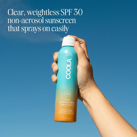 COOLA Clear Sunscreen Spray SPF 30 Tropical Coconut bottle with spray nozzle