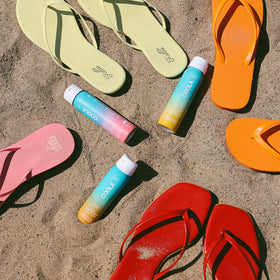 COOLA Clear Sunscreen Spray SPF 30 with tropical coconut scent in packaging