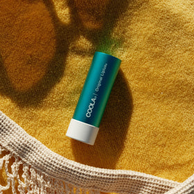 COOLA Liplux SPF 30 Organic Lip Balm texture close-up