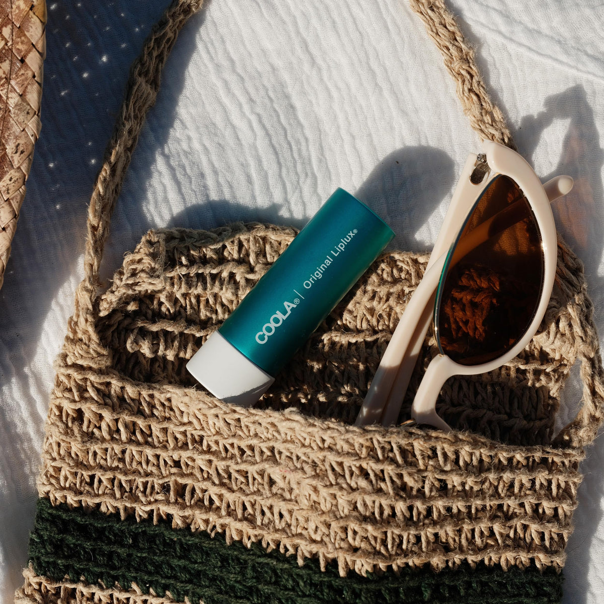 COOLA Liplux SPF 30 Organic Lip Balm with ingredients