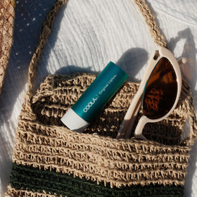 COOLA Liplux SPF 30 Organic Lip Balm with ingredients