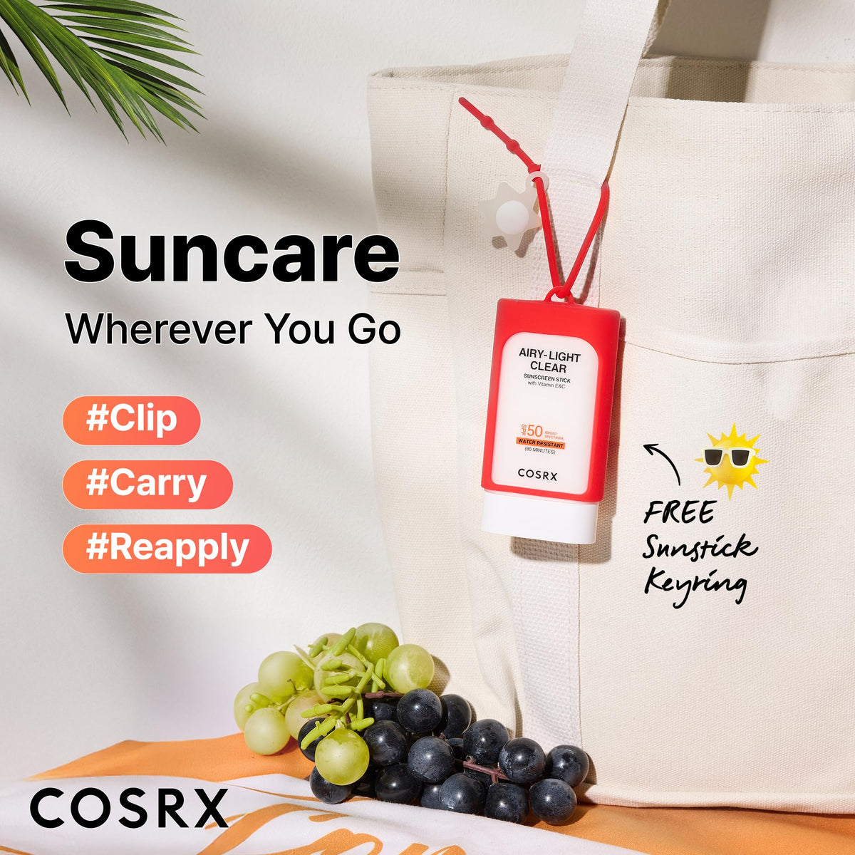 COSRX sunscreen duo on a beach towel