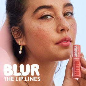 COVERGIRL lipstick in hand with smooth application