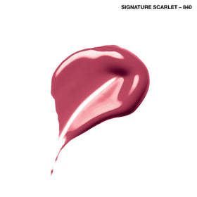 COVERGIRL Outlast All-Day Lip Color 840 Signature Scarlet in lifestyle setting