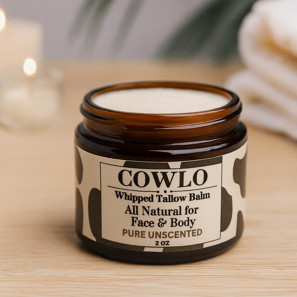 Cowlo Whipped Beef Tallow 2 oz on a bathroom counter