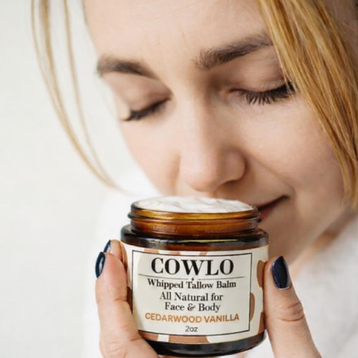 Cowlo Whipped Tallow Balm displayed among natural skincare products