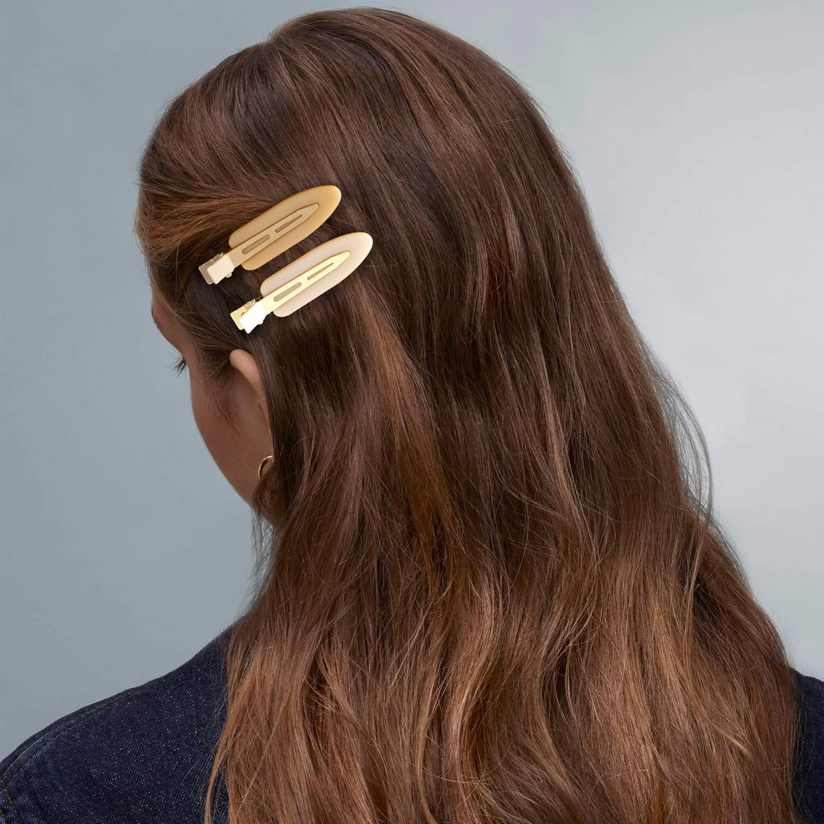 Cptots hair clips displayed in a stylish arrangement