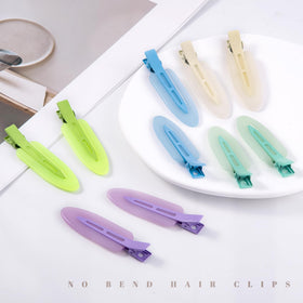 Cptots hair clips in vibrant jelly green and blue