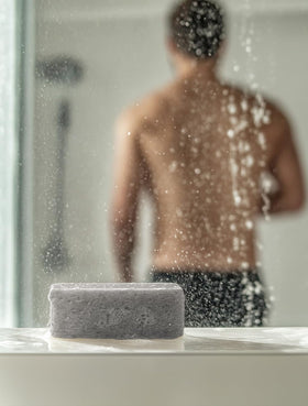 Crate 61 Organics Cedarwood Pine soap lathering on hands