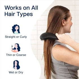 Crave Naturals Biggie Glide Thru Hair Brush on a bathroom counter