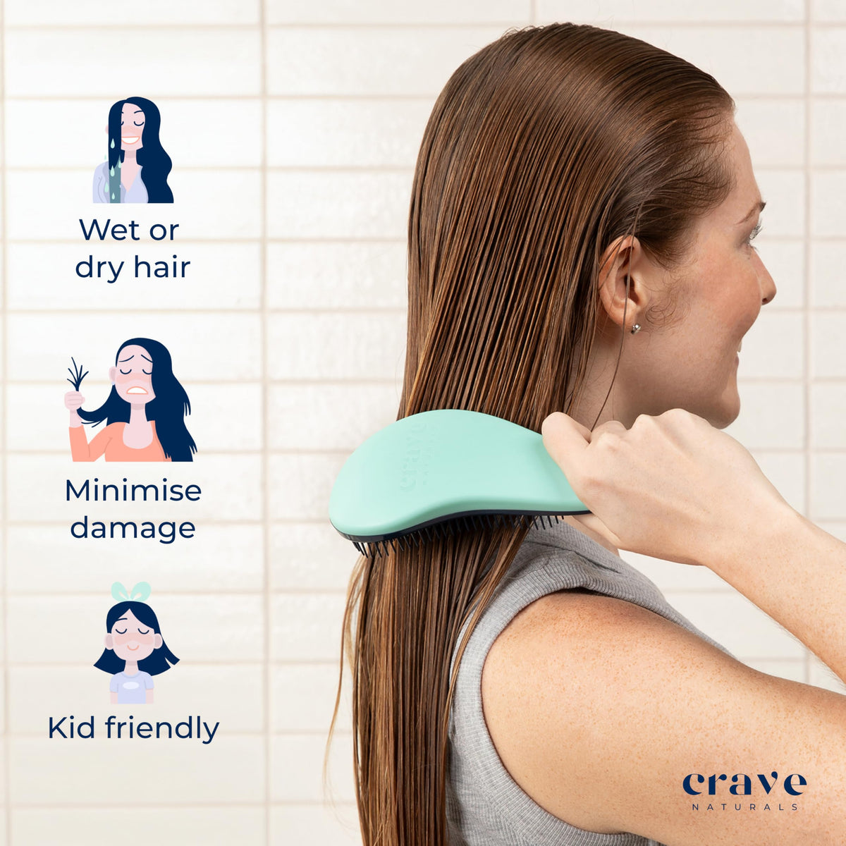Crave Naturals Biggie Glide Thru Hair Brush on a bathroom counter