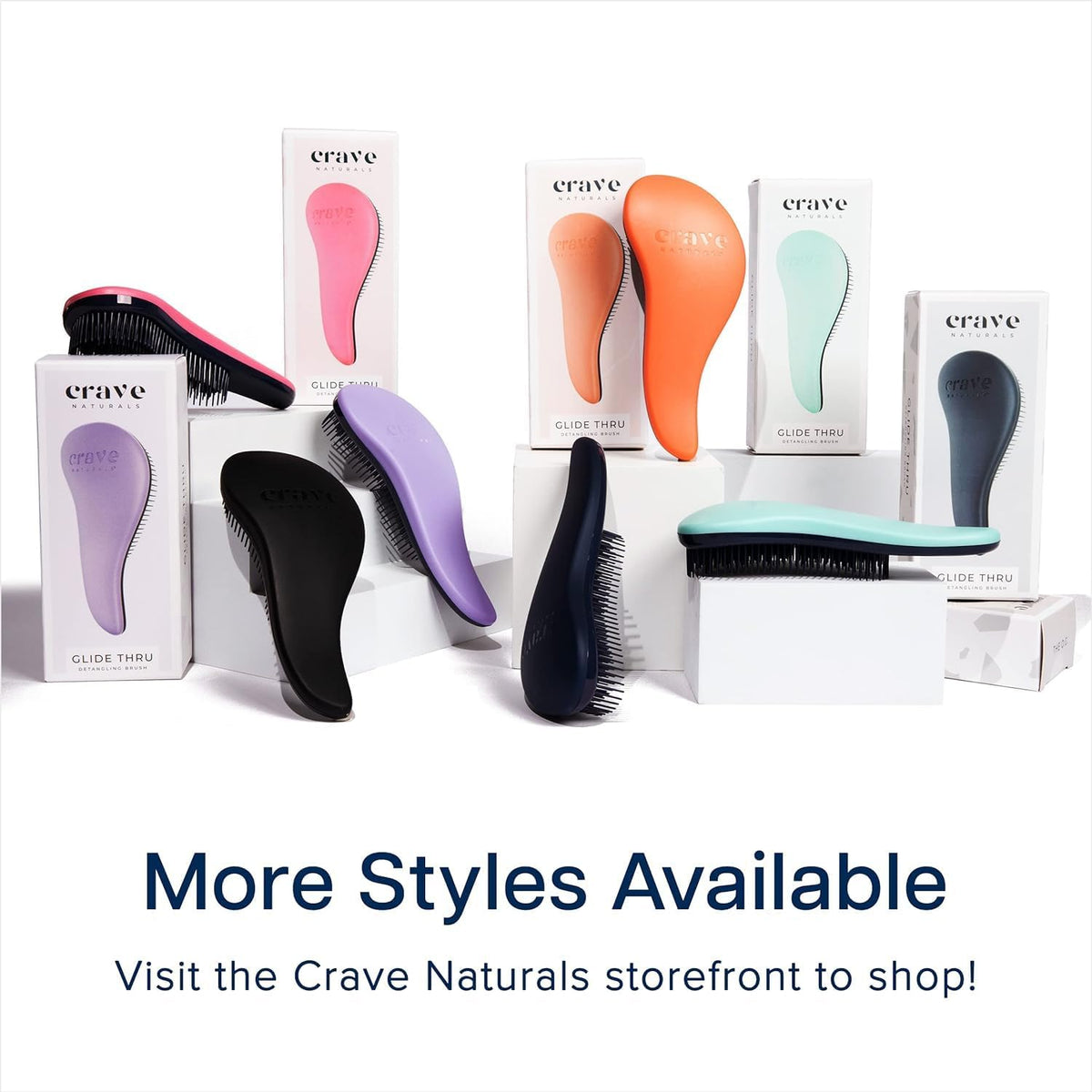 Crave Naturals Biggie Glide Thru Hair Brush on a travel bag