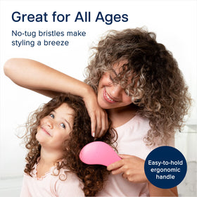 Crave Naturals Glide Thru Detangler Brush on a bathroom counter