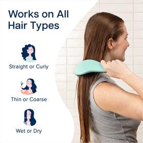 Crave Naturals Glide Thru Detangling Brush on a bathroom counter