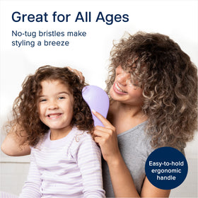 Crave Naturals Glide Thru Detangling Brush with hair strands