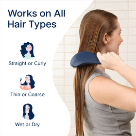 Crave Naturals Glide Thru Detangling Hair Brush on a bathroom counter