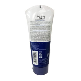 Cream Silk Conditioner Damage Control 350ml blue bottle in bathroom setting