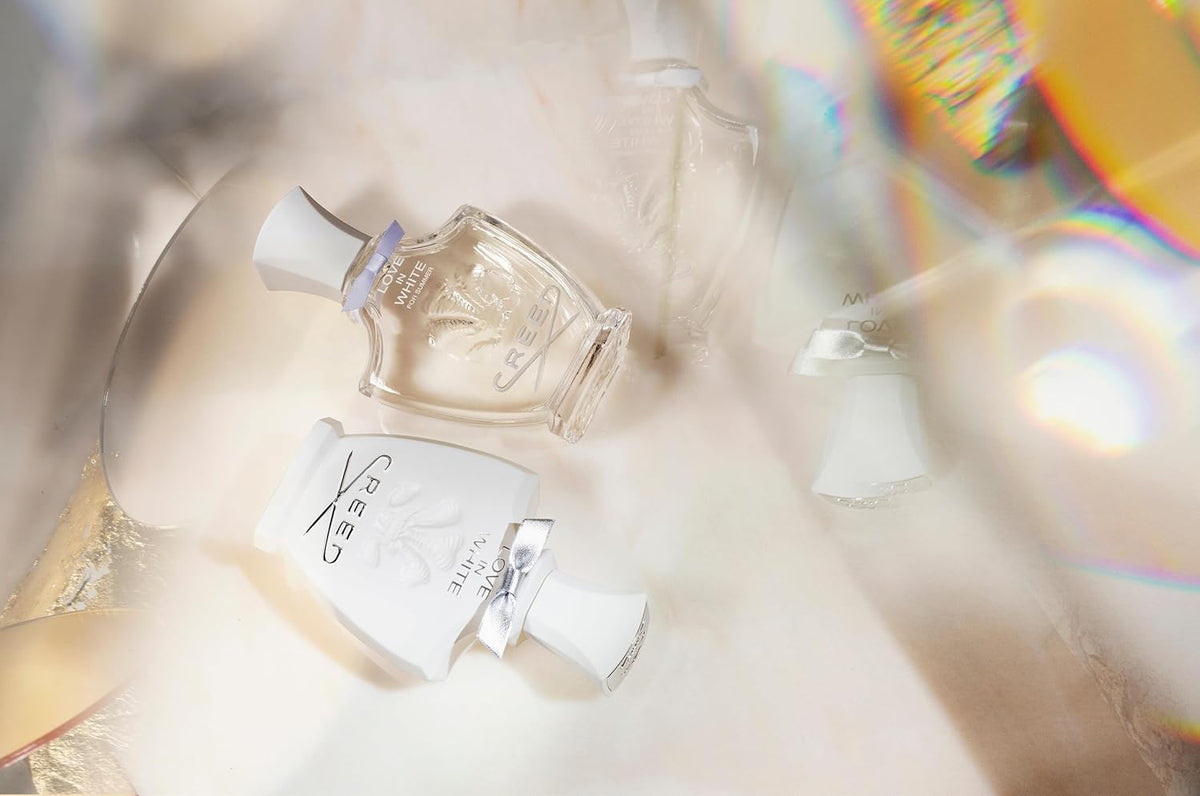Creed Love in White Eau de Parfum bottle on a vanity