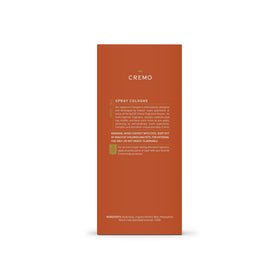 Cremo Golden Amber Cologne on a grooming table