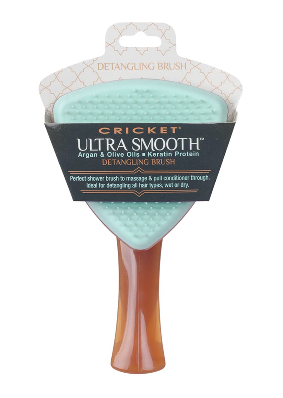 Cricket Ultra Smooth Detangling Brush being used on wet hair