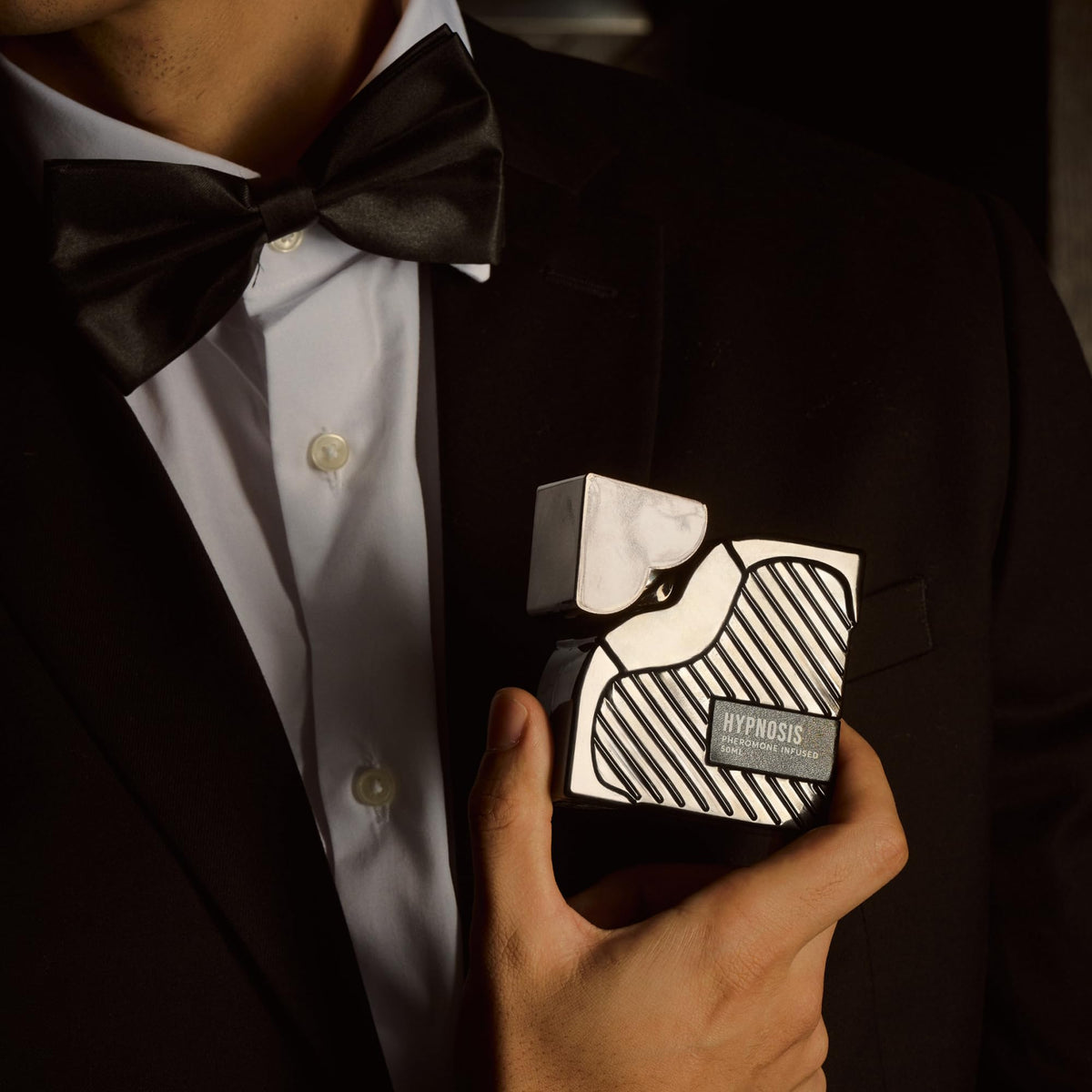 Cupids Hypnosis 3.0 Pheromone Cologne on a table
