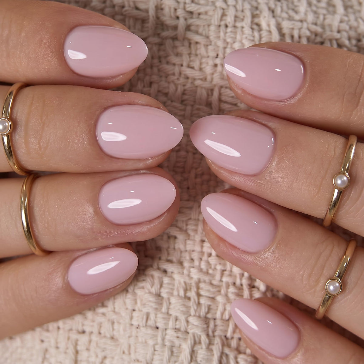 CurvLife Extra Short Almond Press On Nails applied on hands