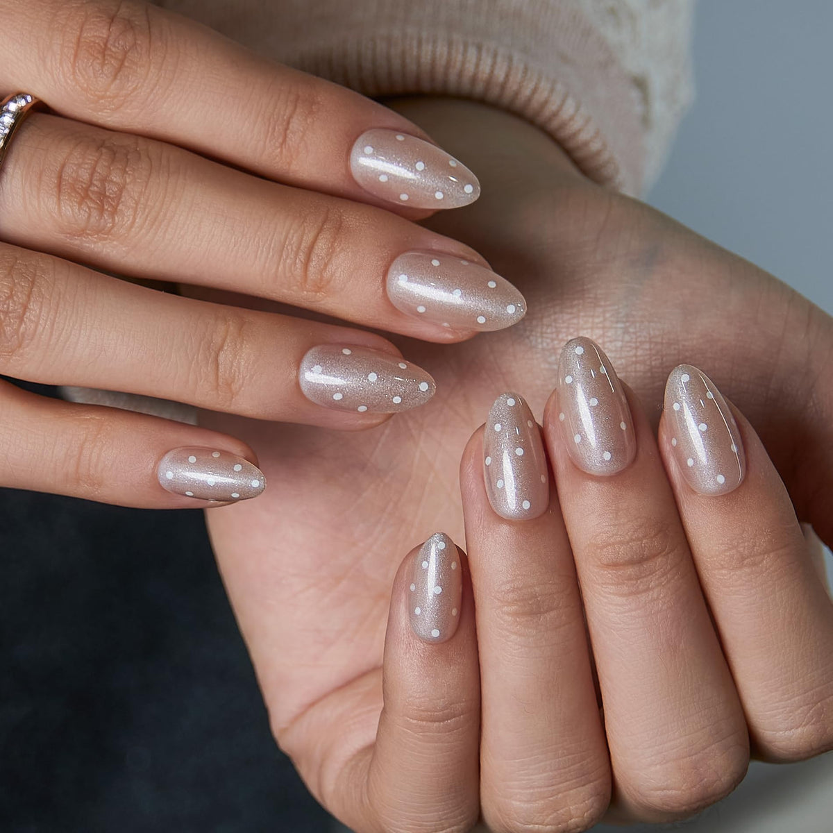 CurvLife Extra Short Almond Press On Nails displayed with nail glue and file