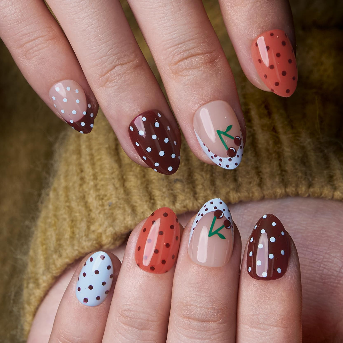 CurvLife Extra Short Almond Press On Nails front view with Sweet Charm Dots