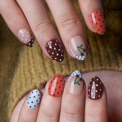 CurvLife Extra Short Almond Press On Nails front view with Sweet Charm Dots