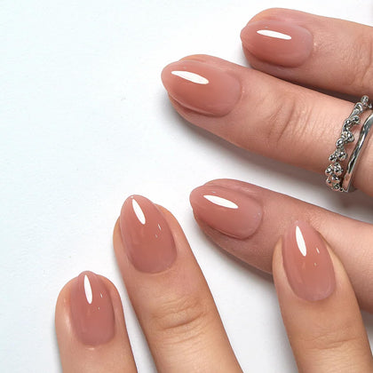 CurvLife Extra Short Almond Press On Nails in Peach Nude Pink front view