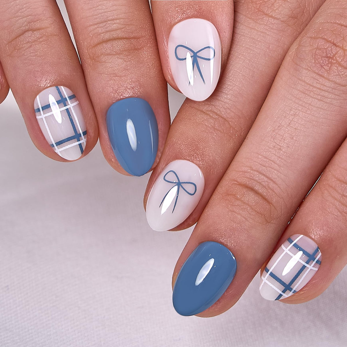 CurvLife Extra Short Almond Press On Nails Misty Bloom Blue front view