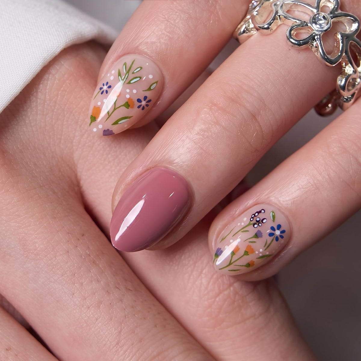 CurvLife Extra Short Almond Press On Nails Rustic Bloom Rust Red on a hand