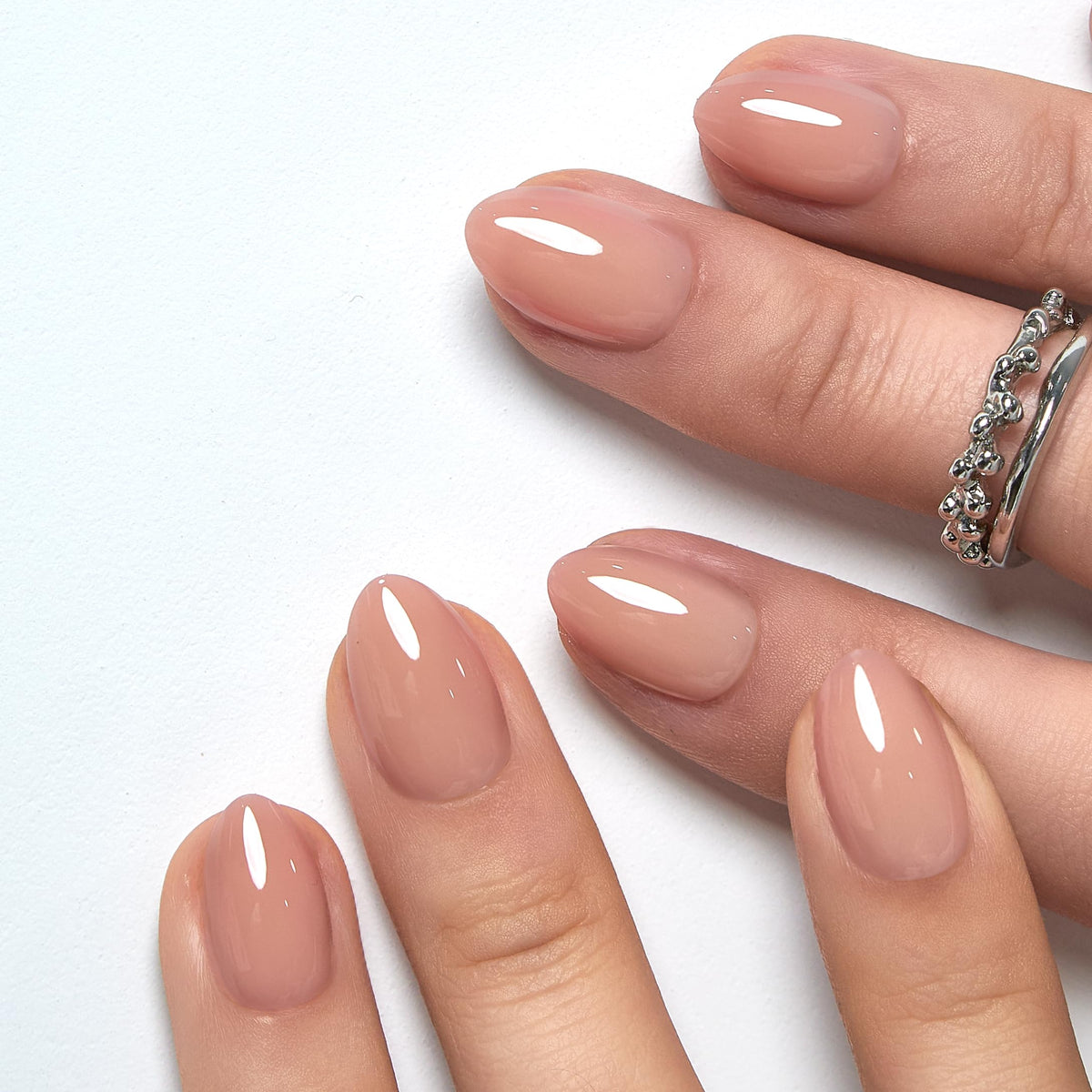 CurvLife Extra Short Almond Press On Nails set in Rouge Muse Nude