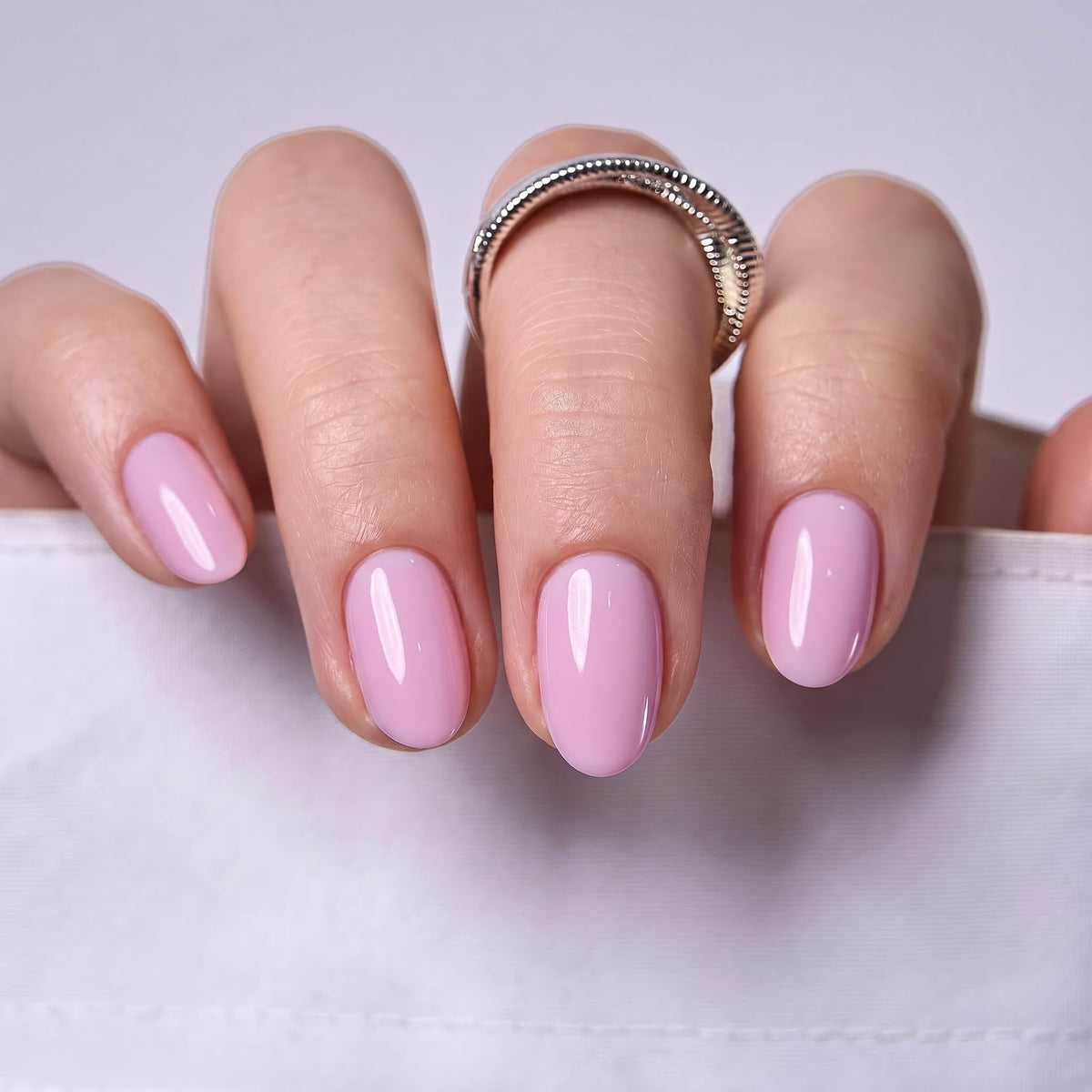 CurvLife Extra Short Almond Press On Nails showing natural fit on fingers