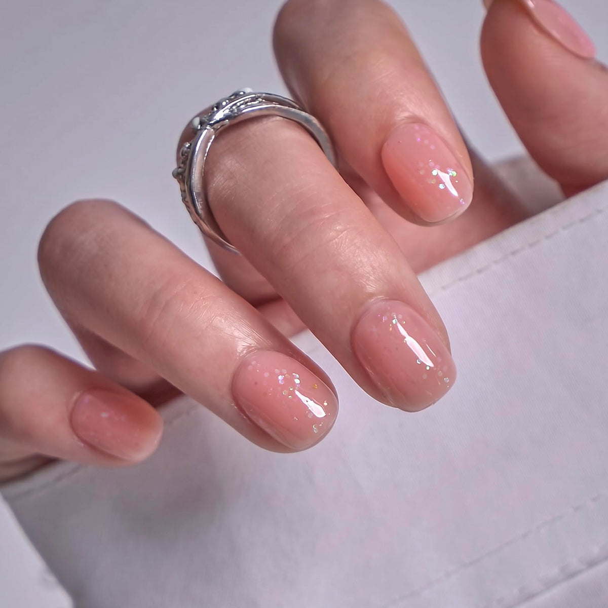 CurvLife Extra Short Square Press On Nails application with adhesive tabs